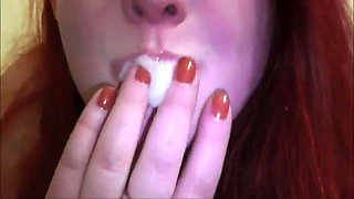 Amateur girl playing with sperm in her mouth