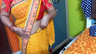 Beautiful Indian bhabhi having wearing a saree.