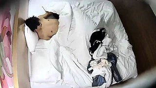 Cute amateur asian web cam girl playing with her toy