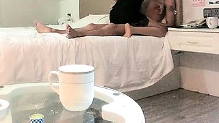 Busty brunette amateur gives sexy blowjob in bedroom
