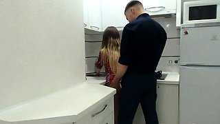 Couple Having Sex In The Kitchen