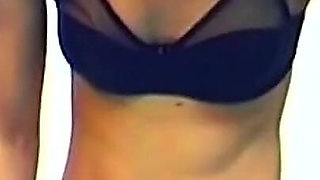 Seductive Brunette Strips and Fingers Her Dripping Pussy Wildly