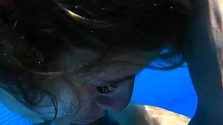 Insatiable MILF Rides Her Lover in the Pool