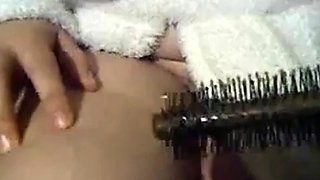 Spiky Hairy Brush Pleasures Pussy on Webcam
