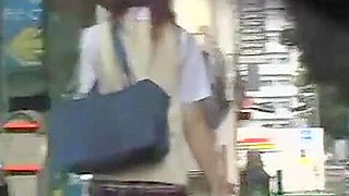 Jolly Japanese babes filmed on a in public