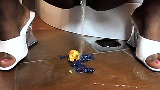 black barbie pee on crushed things