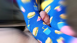 straw with feet wearing very funny stockings