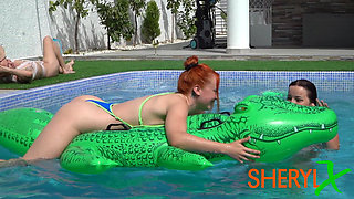 Two Lesbians Have Fun in Outdoor Pool with Happy Ending for Both!