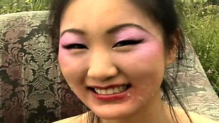 Facialized asian slut swallows