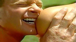 Gorgeous breasty mature woman making guy happy by giving an amazing handjob