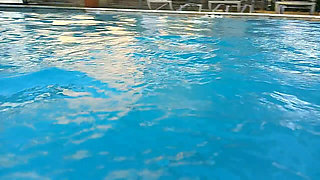 Couple Underwater Diving and Swimming