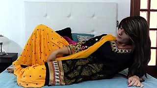 Pretty Indian teen having fun with her boyfriend on the bed