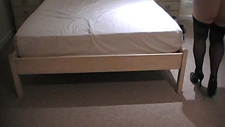 Julie Cunningham Putting on Black Stockings and Stripper Heels