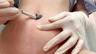I play with medical gloves belly button