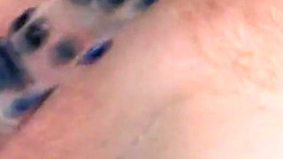 Curly-haired Babe Masturbates with Bottle in Hot Tub