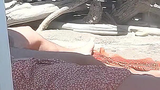 Public Handjob! Teacher Gives Her Student a Handjob on a Nude Beach!