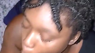 Hot slutty ebony girl gives her black boyfriend a nice long blowjob and lets him cum in her mouth