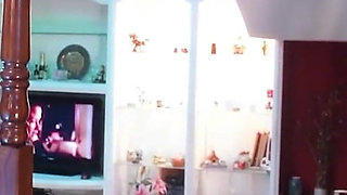 While My Wife Watches TV, She Follows Her Sister up the Stairs.