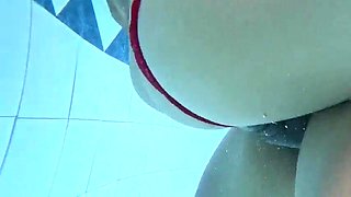 Amateur gonzo lovemaking with a bony Brazilian lady in the pool standing up outdoors