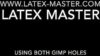 Latex Dominant Using One As Well As The Other Gimp Holes