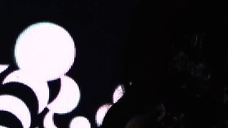 Slender petite ebony MILF strips naked