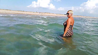 Stranger Looking on Me in the Beach