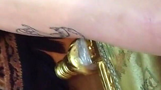 Worshiping the feet of a tattooed gothic lady