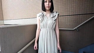 ERIKA, a young wife with short bob hair, beautiful eyes and