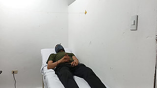 Perverted doctor masturbates cock in the office