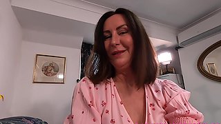 Brunette Lara Latex having fun while fingering her pussy