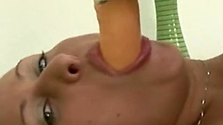 Blonde Babe Pleasures Herself with Orange Dildo