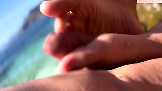 Linda Spanish gives me a footjob on the beach and I