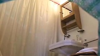 Black Stepsister bending in bathroom (spy cam)