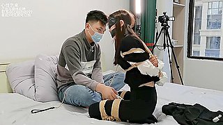 Asian Lady Blindfolded And Bound