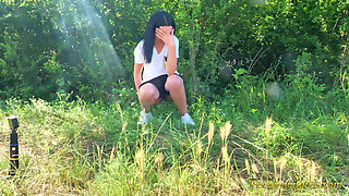 Sexy Brunette Trying Hard to Empty Her Bladder Outside, Then Quick Pee Next to a House in Construction