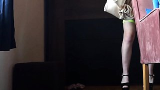 Redhead co-ed slowly strips to lingerie while cleaning her r