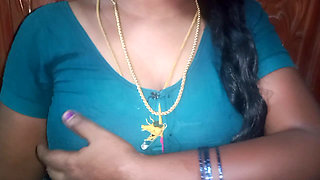 Tamil aunty squeezing her breasts when she is alone and unable to control her emotions.