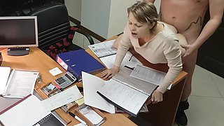 Hot office secretary sucks and rides her boss on the desk