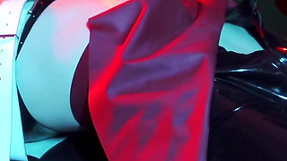 Heavy rubber masked latexgirl stretched and tickled