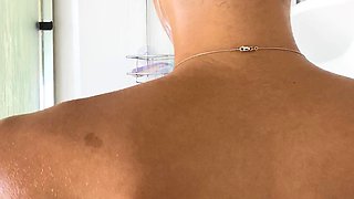 Busty curly brunette with big boobs fucks on couch