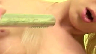 Teen playing with her wet dildo