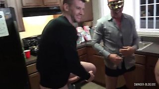 Hot MILF gives double blowjob in amateur swinger party