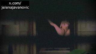 Spy Blonde Woman at the window