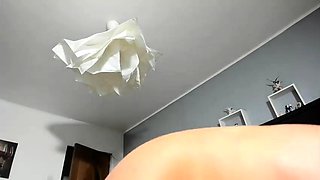 Busty curly brunette with big boobs fucks on couch