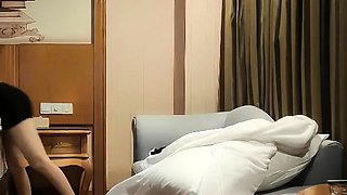 Cute amateur asian web cam girl playing with her toy