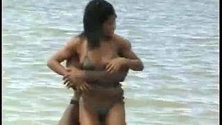 Hot mulatto with a big tail moaning and enjoying giving her pussy and spitting on the beach: Porn