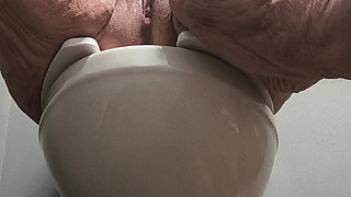 She's Enjoying Rubbing Her Pussy on the Toilet