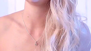 She Strokes Her Pink Pussy