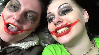 Two crazy clown girls dangle you above their hungry mouths before fighting over who will eat you alive