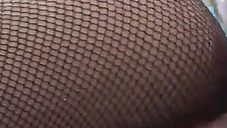 Spanking Leads to a Cumshot on Her Fishnets Ass